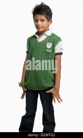 Portrait of a smiling boy standing in poppy field Stock Photo - Alamy