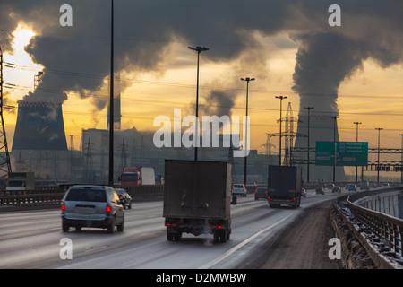 City ring way with cars and air pollution from heat electric generation plant in Saint-Petersburg, Russia Stock Photo