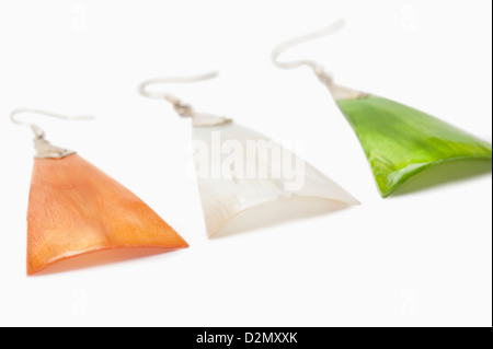 Close-up of tricolor earrings representing Indian flag colors Stock Photo