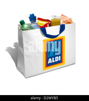 A white Aldi shopping bag full of groceries on a white background