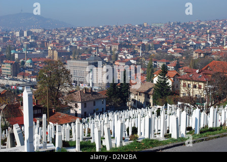 War graves overlooking the National Library which was destroyed during the war. It is being restored with donations from Turkey.