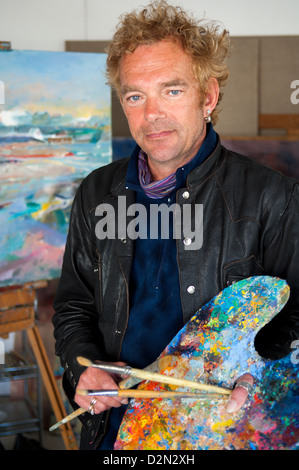 Art, creative and artist painting in studio for exhibition with ...