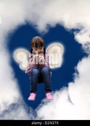 Little girl in the sky Stock Photo