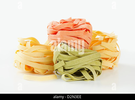 Bundles of dried ribbon pasta Stock Photo