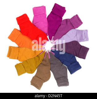 New colored socks stacked around. Isolate on white. Stock Photo