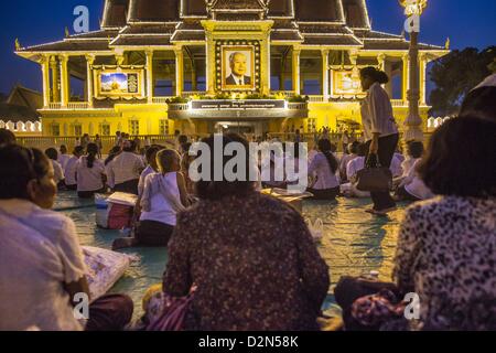 Jan. 29, 2013 - Phnom Penh, Cambodia - People gather on the plaza in front of the Royal Palace in Phnom Penh, Cambodia, to mourn for late Cambodian King Norodom Sihanouk. Sihanouk (31 October 1922Â â€“ 15 October 2012) was the King of Cambodia from 1941 to 1955 and again from 1993 to 2004. He was the effective ruler of Cambodia from 1953 to 1970. After his second abdication in 2004, he was given the honorific of ''The King-Father of Cambodia.'' Sihanouk held so many positions since 1941 that the Guinness Book of World Records identifies him as the politician who has served the world's greatest Stock Photo