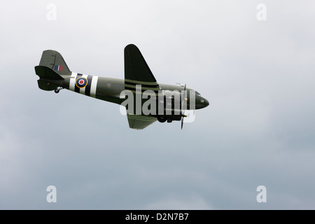 Douglas C-47 Dakota C3 ZA947 in flight over Wickenby Airfield Stock Photo