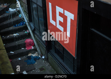 Rundown streets, To Let signs,  and boarded up shops, in the City centre, in Glasgow, Scotland, Great Britain, 2013. Stock Photo