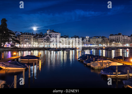 Buildings on the river in the moonlight. Zurich, Switzerland. Stock Photo