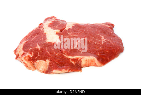 Raw matured rib eye against white background Stock Photo