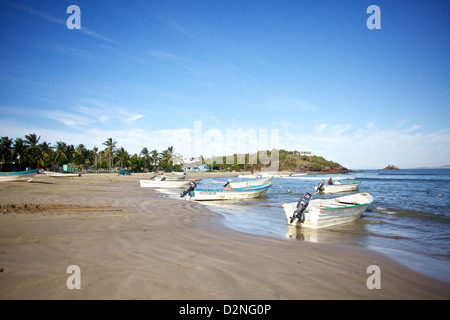 Fishing boats on the beach in Mazatlan, Mexico Stock Photo