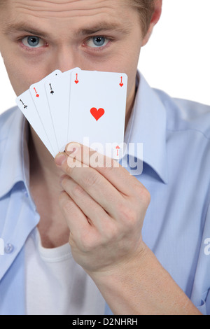 Man with four ACES Stock Photo