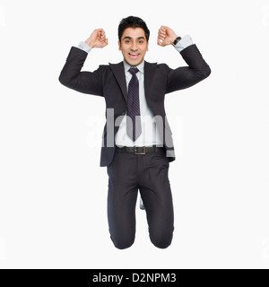 Portrait of a businessman cheering Stock Photo