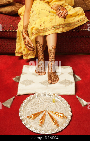 Bride's feet with henna decoration Stock Photo