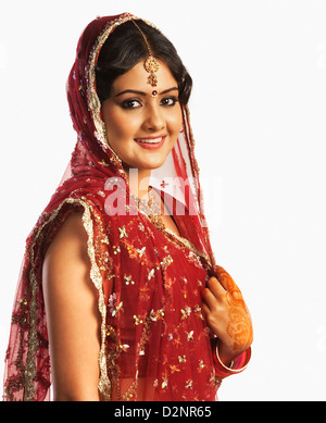 Portrait of a bride in a traditional wedding dress Stock Photo
