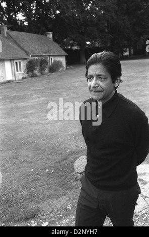 VS Naipaul V S portrait outside his Oxfordshire cottage home in 1971. England.1970s UK HOMER SYKES Stock Photo