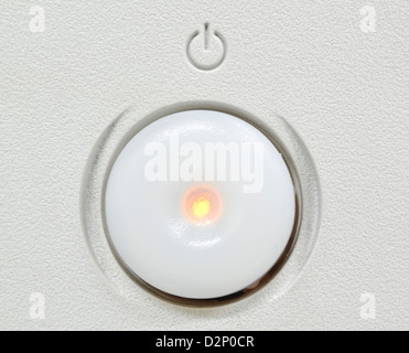 vintage round shape power switch button closeup Stock Photo