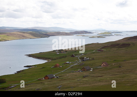 Coastal view of Sandsound Voe to Hildasay Island in the Shetland Islands. Stock Photo