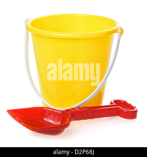 yellow toy bucket and red scoop, isolated on white Stock Photo