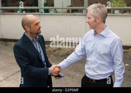 Two men shaking hands. Stock Photo