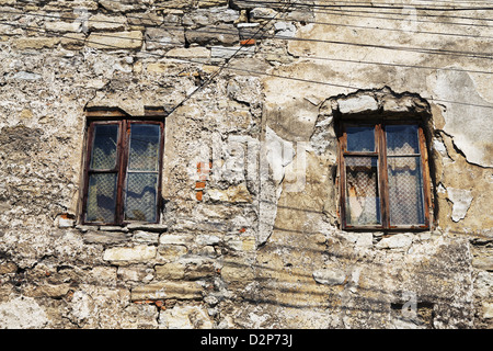 two window of abandoned house at day Stock Photo