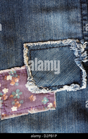 patches on toddler's denim jeans Stock Photo