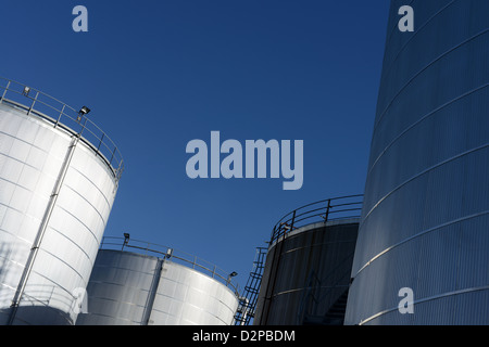 storage tanks at an industrial production plant and processing facility Stock Photo