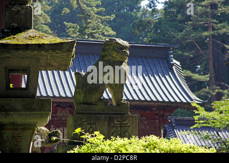 A Komainu lion-dog statue at Sengen Jinja shrine Fujiyoshida Yamanashi Japan Stock Photo