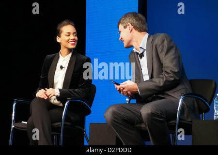 President and Chief Executive Officer of Resarch in Motion (RIM), Thorsten Heins, promotes the new BlackBerry touch screen handsets together with US singer Alicia Keys in New York City, NY, USA. 30 January 2013. RIM launched its new BlackBerry 10 smartphone on 30 January. The company announced two new touch screen smartphones, the BlackBerry Z10 and the BlackBerry Q10. Photo: Daniel Schnettler dpa/Alamy live news.  Stock Photo