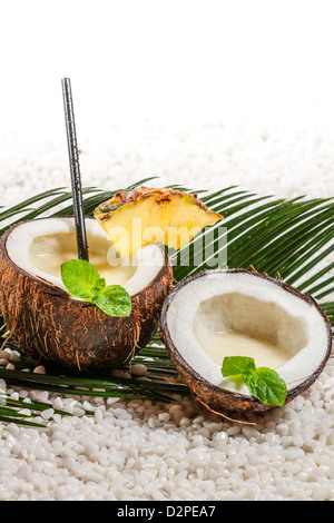 Fresh pinacolada drink served in a coconut Stock Photo