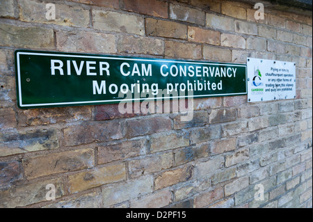 Sign by City Council advising no mooring or plying for hire by punt chauffeurs Garrett Hostel Lane Cambridge UK Stock Photo