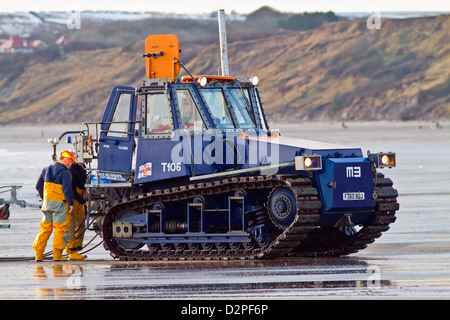 the filey lifeboat tractor is been put into action Stock Photo