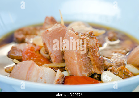 close up stewed pork knuckle with tomato and vegetable Stock Photo