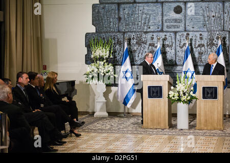 President Shimon Peres (R) thanks the Central Elections Committee (L) and its Chairman, Supreme Court Judge Elyakim Rubinstein (C), for their work during the elections. Jerusalem, Israel. 30-Jan-2013.  President Peres receive official results of the Israeli elections for 19th Knesset from Judge Elyakim Rubinstein, Chair of Central Elections Committee. Peres to begin round of consultations before appointing the task of forming the coalition. Stock Photo