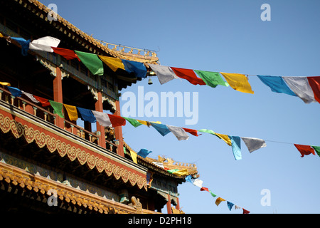 prayers flags on the wind in Buddhist Lama Temple in Beijing, China Stock Photo