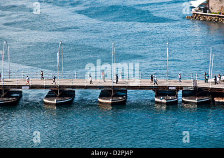 Aerial view of Queen Emma floating pontoon bridge used for pedestraian traffic across St. Anna Bay channel, Willemstad, Curacao Stock Photo