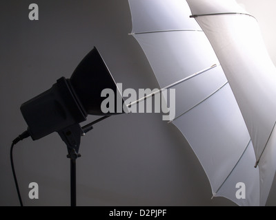 Light umbrella reflector used in photographic studio Stock Photo