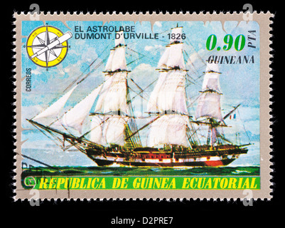 Postage stamp from Equatorial Guinea depicting the sailing vessel, Astrolabe, ship captained by Dumont D'urville. Stock Photo