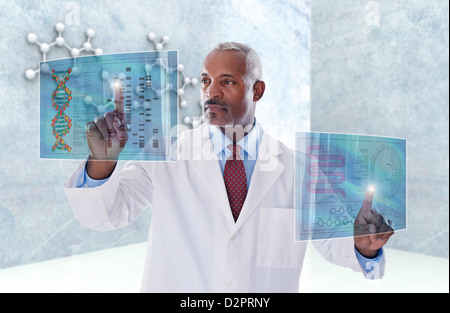 Black doctor using digital display Stock Photo