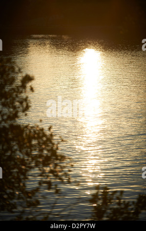 Sun reflections on river Stock Photo