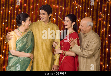 Happy family standing together Stock Photo