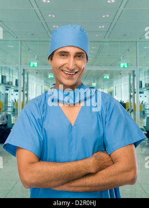 Portrait of a male surgeon smiling Stock Photo - Alamy