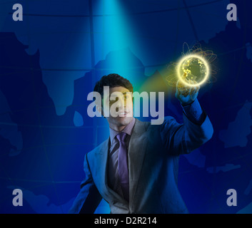 Businessman using futuristic touch screen Stock Photo