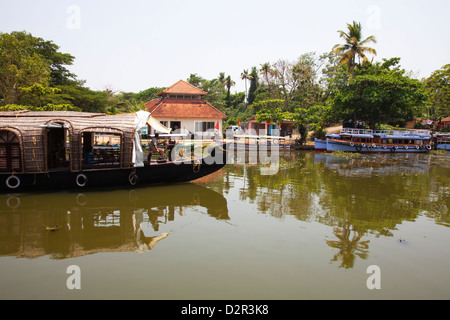 Traditional Kettuvallom (private houseboat) travelling along the Kerala Backwaters, Kerala, India, Asia Stock Photo