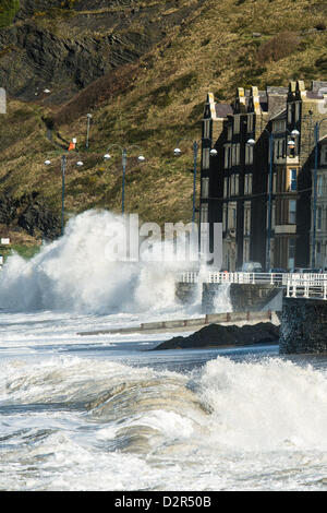 Aberystwyth Wales UK.  January 31 2013 Gale force winds and stormy seas batter the seafront and beach at Aberystwyth on the west Wales coast.  Parts of Wales have been put on flood alert as a Met Office 'yellow' warning for heavy rain, severe gales and even snow are expected to hit the southern half of the country on Friday. photo ©keith morris Stock Photo