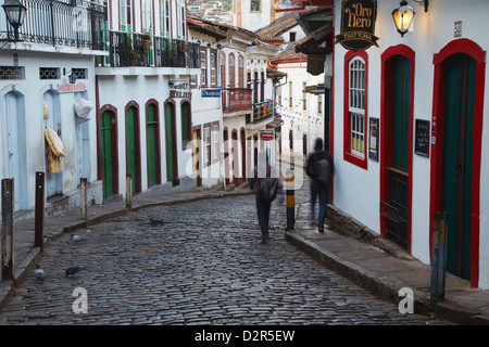 People walking along street, Ouro Preto, UNESCO World Heritage Site, Minas Gerais, Brazil, South America Stock Photo