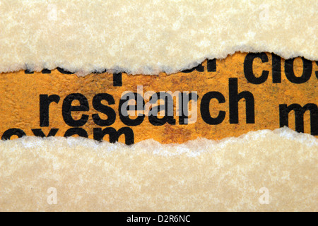Research text on paper hole Stock Photo