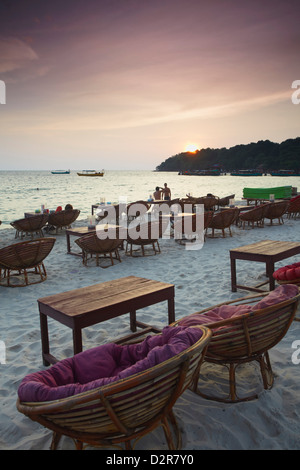 Beach restaurants at dusk on Ochheuteal Beach, Sihanoukville, Cambodia, Indochina, Southeast Asia, Asia Stock Photo