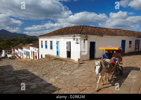 Horse-drawn carriage on cobblestone street, Tiradentes, Minas Gerais, Brazil, South America Stock Photo