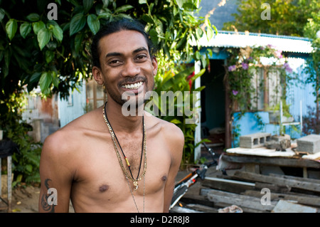 young man at creole house, port louis, mauritius Stock Photo